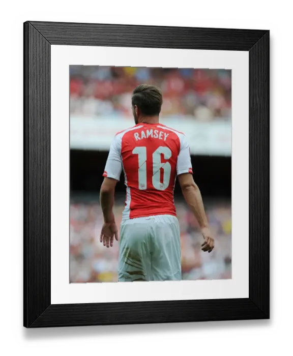 Framed Print : Arsenal's Aaron Ramsey in Action Against Benfica at Emirates Cup 2014