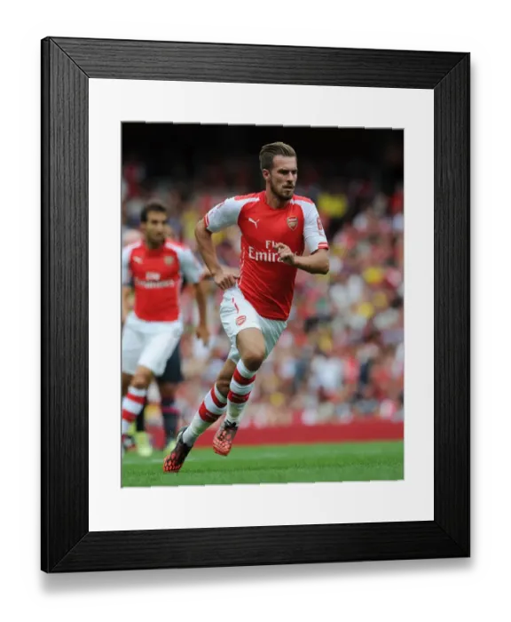 Framed Print : Arsenal's Aaron Ramsey in Action Against Benfica at Emirates Cup 2014