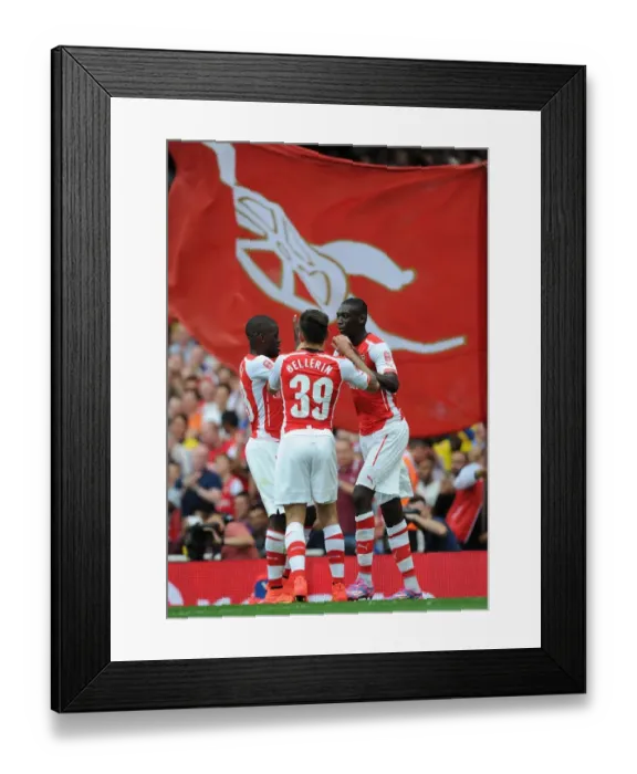 Framed Print : Arsenal's Yaya Sanogo Scores First Goal vs Benfica at Emirates Cup 2014-15