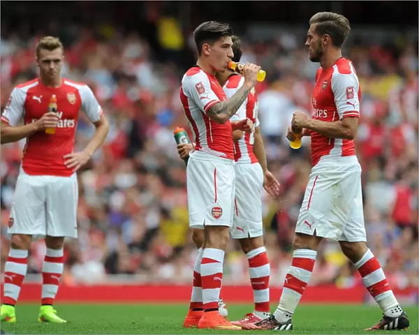 Arsenal's Hector Bellerin and Aaron Ramsey in Action against Benfica at the Emirates Cup, 2014