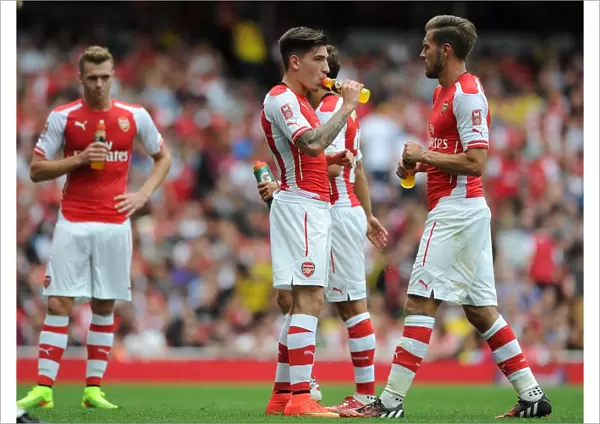 Arsenal's Hector Bellerin and Aaron Ramsey in Action against Benfica at the Emirates Cup, 2014