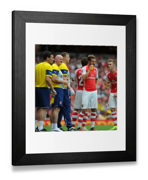 Framed Print : Arsenal Medical Team Tending to Calum Chambers and Aaron Ramsey during Arsenal v Benfica, Emirates Cup 2014-15