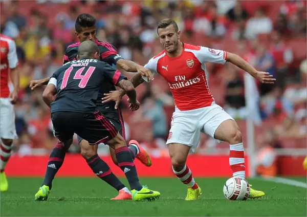 Arsenal's Jack Wilshere Clashes with Benfica's Maxi Pereira in Emirates Cup Showdown