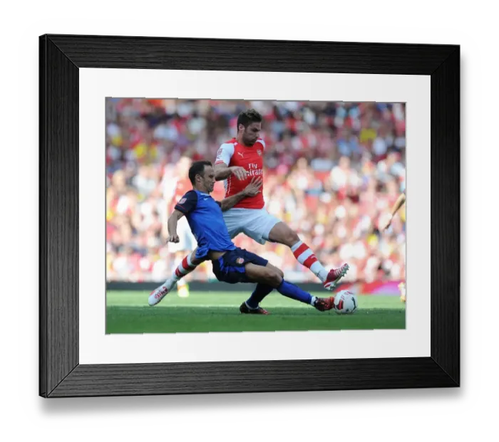 Framed Print : Giroud vs. Carvalho: Intense Battle at the Emirates Cup