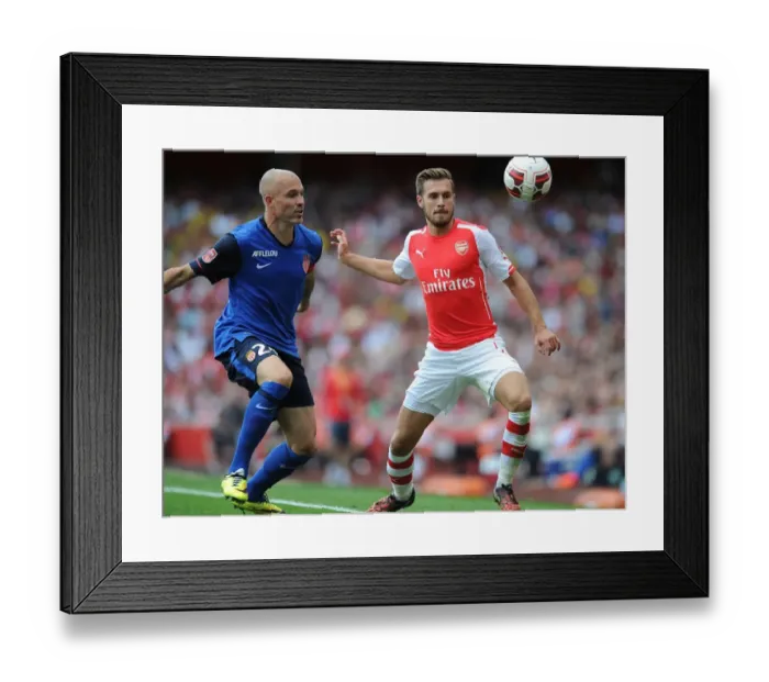 Framed Print : Clash of Champions: Ramsey vs. Raggi - Arsenal vs. AS Monaco, Emirates Cup 2014