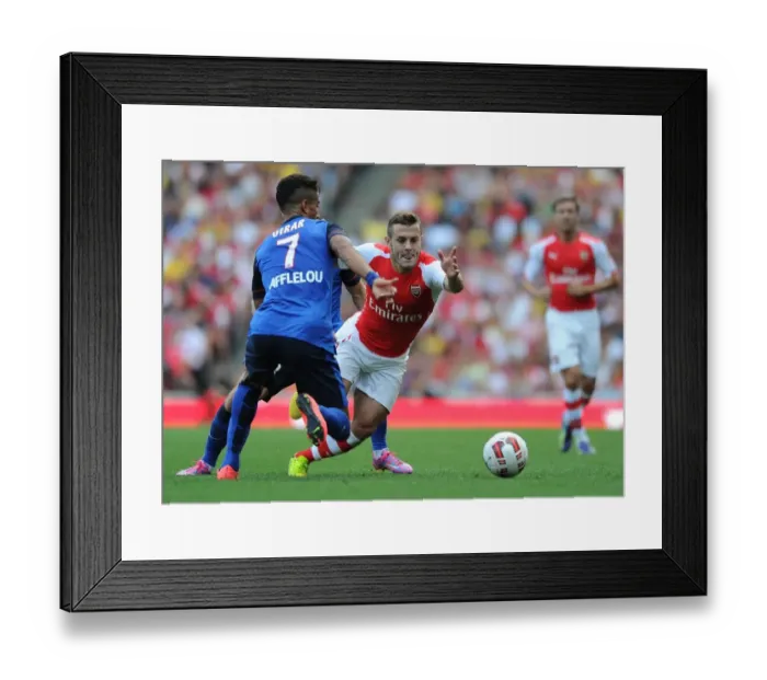 Framed Print : Clash of Midfield Geniuses: Jack Wilshere vs. Nabil Dirar, Arsenal vs. AS Monaco, 2014