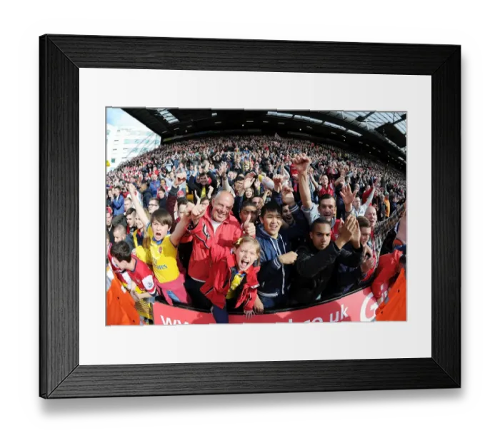 Framed Print : Arsenal Fans Celebrate Victory Over Norwich City in Premier League Framed Print : Arsenal Fans Celebrate Victory Over Norwich City in Premier League