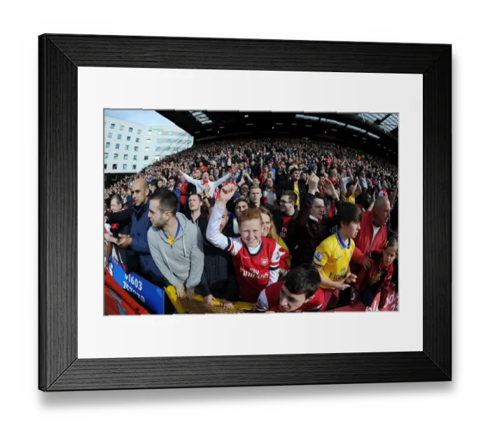 Framed Print : Arsenal Fans Celebrate Thrilling Victory Over Norwich City in Premier League Framed Print : Arsenal Fans Celebrate Thrilling Victory Over Norwich City in Premier League