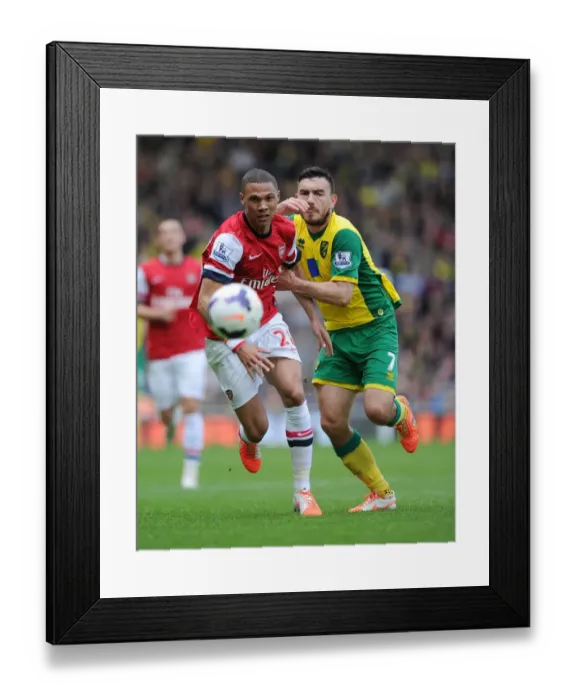 Framed Print : Clash at Carrow Road: Gibbs vs. Snodgrass in the Premier League Battle