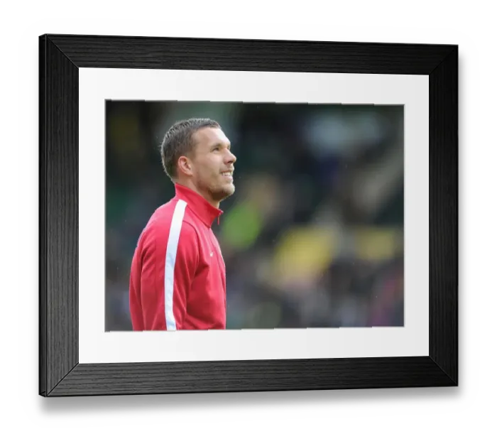 Framed Print : Lukas Podolski: Arsenal's Pre-Match Focus at Norwich City (2013-14) Framed Print : Lukas Podolski: Arsenal's Pre-Match Focus at Norwich City (2013-14)