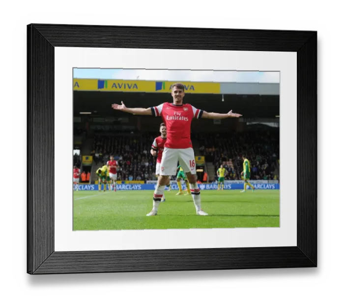 Framed Print : Euphoria Unleashed: Aaron Ramsey's Thrilling Goal Celebration vs. Norwich City, Premier League 2013-14