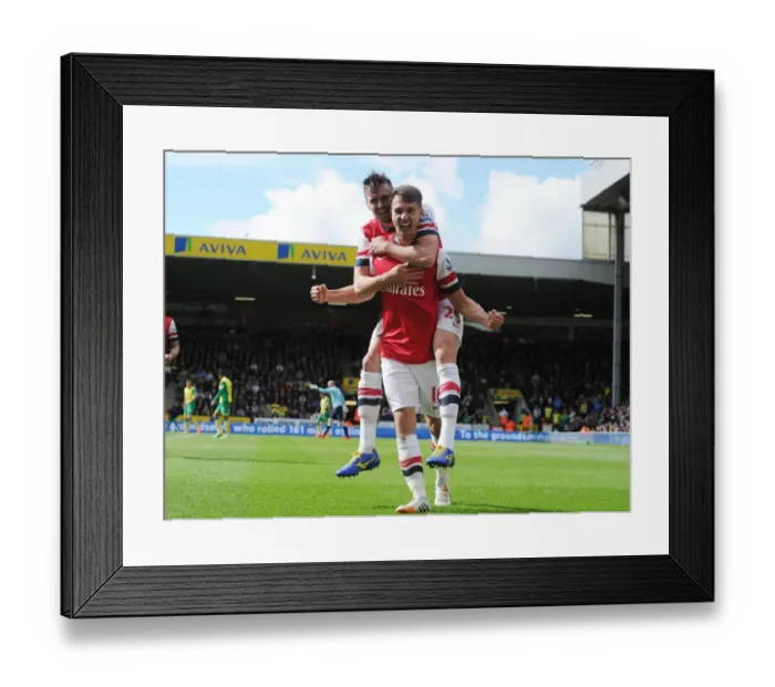 Framed Print : Celebrating Glory: Ramsey and Jenkinson's Unforgettable Goal Connection (Norwich City vs. Arsenal, 2013-14)
