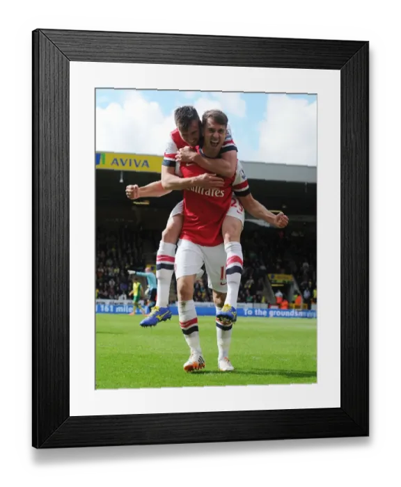 Framed Print : Ramsey and Jenkinson Celebrate Arsenal's Goal Against Norwich City (2013-14) Framed Print : Ramsey and Jenkinson Celebrate Arsenal's Goal Against Norwich City (2013-14)