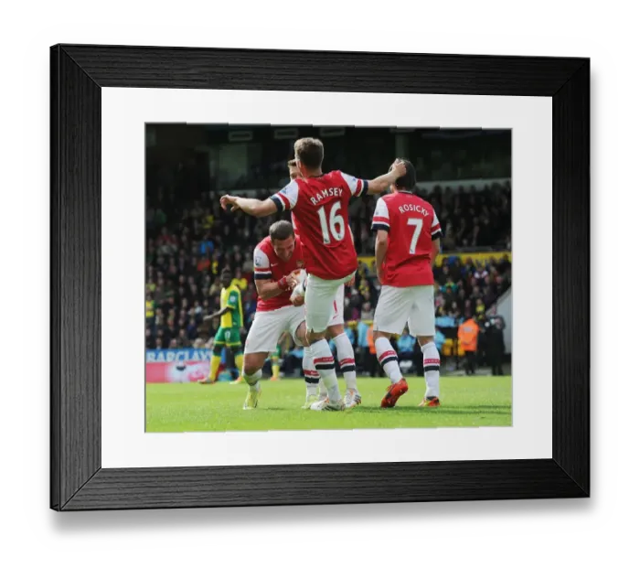 Framed Print : Ramsey and Podolski Celebrate Arsenal's First Goal Against Norwich City (2013-14) Framed Print : Ramsey and Podolski Celebrate Arsenal's First Goal Against Norwich City (2013-14)