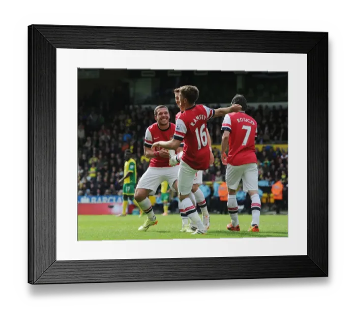 Framed Print : Arsenal's Ramsey and Podolski: United in Victory - First Goal vs. Norwich City (2013-14) Framed Print : Arsenal's Ramsey and Podolski: United in Victory - First Goal vs. Norwich City (2013-14)