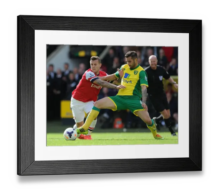 Framed Print : Wilshere vs. Johnson: Intense Battle in Norwich City vs. Arsenal (Premier League 2013-14) Framed Print : Wilshere vs. Johnson: Intense Battle in Norwich City vs. Arsenal (Premier League 2013-14)