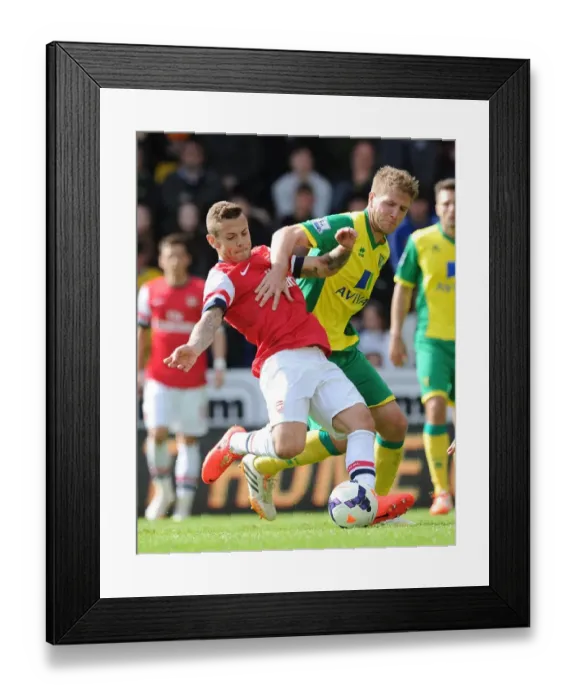 Framed Print : Clash of Champions: Jack Wilshere vs Michael Turner at Carrow Road