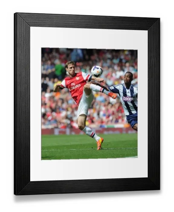 Framed Print : Monreal vs. Berahino: Intense Battle at Emirates Stadium (Arsenal v West Bromwich Albion, Premier League 2013-14) Framed Print : Monreal vs. Berahino: Intense Battle at Emirates Stadium (Arsenal v West Bromwich Albion, Premier League 2013-14)