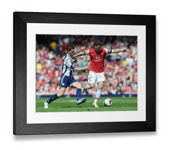 Framed Print : Mesut Ozil Outmaneuvers Graham Dorrans: Arsenal vs West Bromwich Albion, Premier League 2013-14