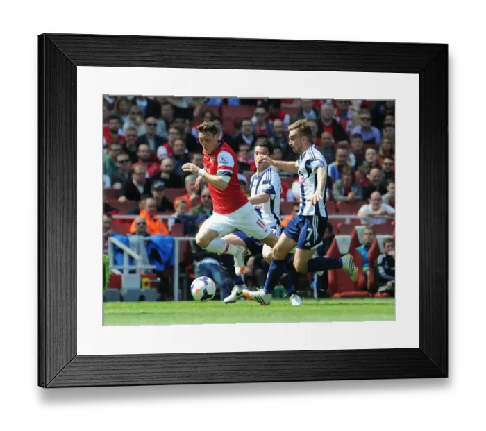Framed Print : Mesut Ozil vs James Morrison: Intense Battle at Arsenal vs West Bromwich Albion (2013-14) Framed Print : Mesut Ozil vs James Morrison: Intense Battle at Arsenal vs West Bromwich Albion (2013-14)