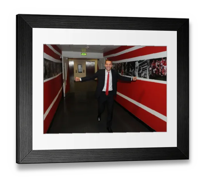 Framed Print : Arsenal's Deadly Weapon: Lukas Podolski Gears Up for Battle Against West Bromwich Albion (2013-14)