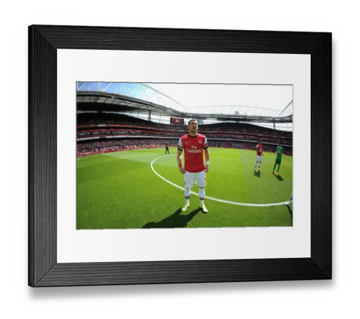 Framed Print : Arsenal's Lukas Podolski Readies for Arsenal vs. West Bromwich Albion (2013-14)