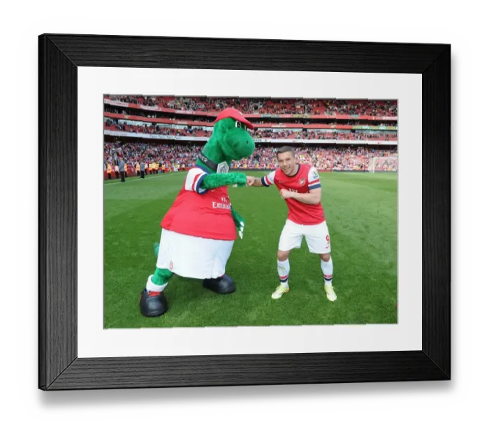 Framed Print : Lukas Podolski with Gunnersaurus: Arsenal vs. West Bromwich Albion, Premier League 2013-14 Framed Print : Lukas Podolski with Gunnersaurus: Arsenal vs. West Bromwich Albion, Premier League 2013-14