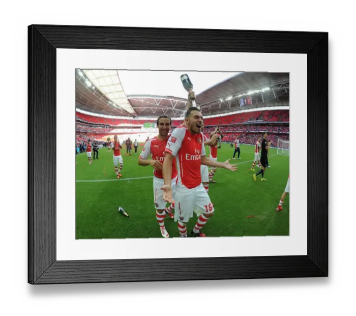 Framed Print : Celebration at the Community Shield: Flamini and Ramsey's Emotional Moment after Arsenal's Win over Manchester City Framed Print : Celebration at the Community Shield: Flamini and Ramsey's Emotional Moment after Arsenal's Win over Manchester City
