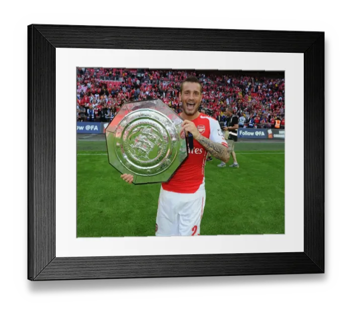 Framed Print : Mathieu Debuchy's Exultant Moment: Arsenal's FA Community Shield Triumph over Manchester City Framed Print : Mathieu Debuchy's Exultant Moment: Arsenal's FA Community Shield Triumph over Manchester City