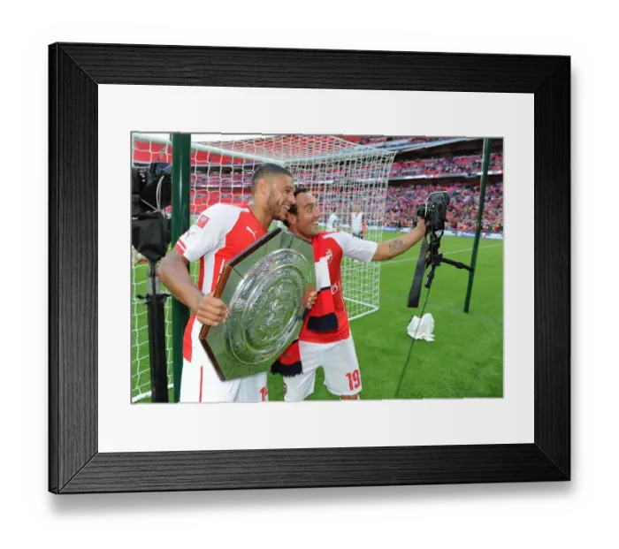 Framed Print : Arsenal's Oxlade-Chamberlain vs Cazorla: A Pre-Season Rivalry - Arsenal vs Manchester City, FA Community Shield 2014 / 15