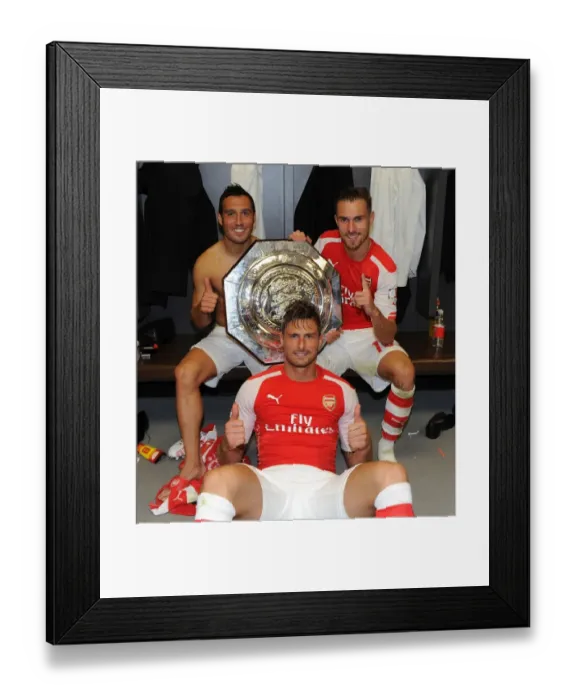 Framed Print : Arsenal's Cazorla, Giroud, and Ramsey Celebrate FA Community Shield Victory over Manchester City Framed Print : Arsenal's Cazorla, Giroud, and Ramsey Celebrate FA Community Shield Victory over Manchester City