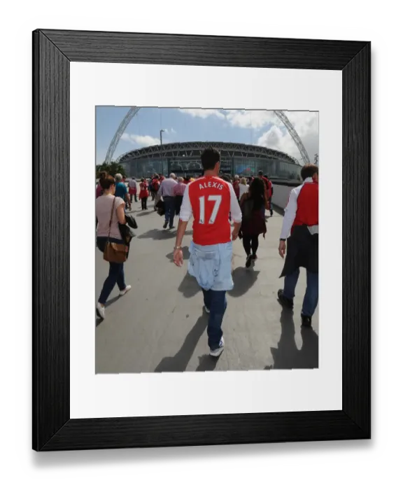 Framed Print : Fans walk to the stadium before the match. Arsenal 3: 0 Manchester City. FA Community Shield Framed Print : Fans walk to the stadium before the match. Arsenal 3: 0 Manchester City. FA Community Shield
