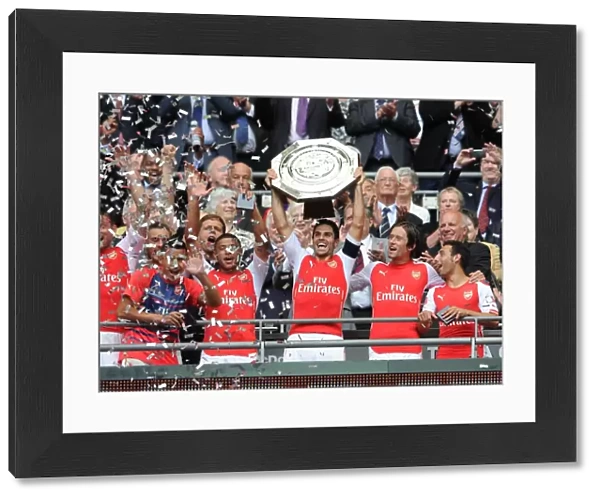 Arsenal's Mikel Arteta and Team Celebrate FA Community Shield Victory over Manchester City