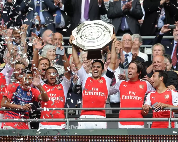Arsenal's Mikel Arteta and Team Celebrate FA Community Shield Victory over Manchester City
