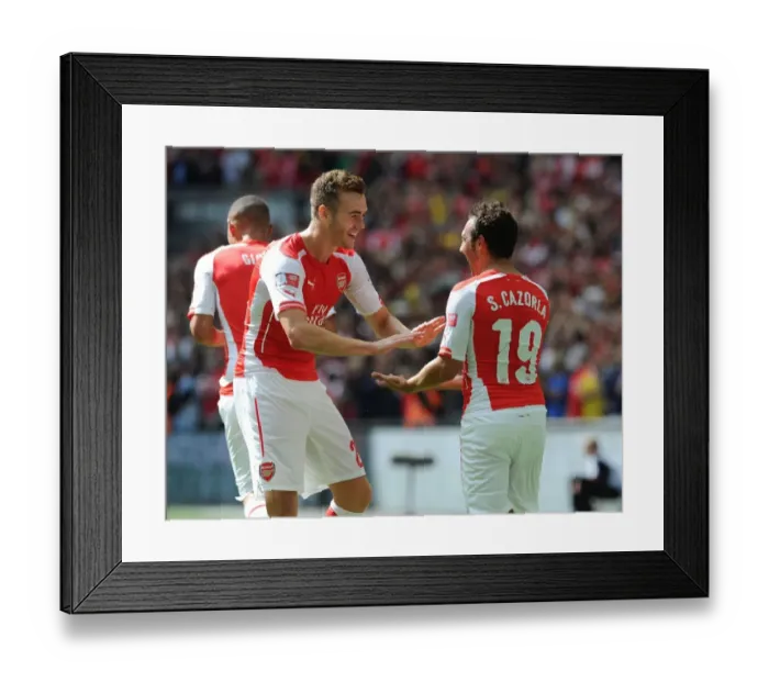 Framed Print : Cazorla and Chambers Celebrate Arsenal's First Goal Against Manchester City - FA Community Shield 2014 / 15 Framed Print : Cazorla and Chambers Celebrate Arsenal's First Goal Against Manchester City - FA Community Shield 2014 / 15