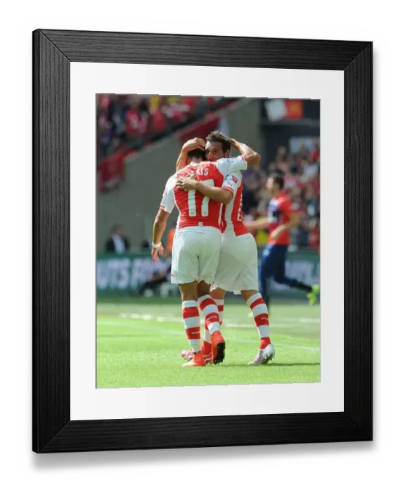 Framed Print : Cazorla and Sanchez Celebrate Arsenal's First Goal Against Manchester City - FA Community Shield 2014 / 15 Framed Print : Cazorla and Sanchez Celebrate Arsenal's First Goal Against Manchester City - FA Community Shield 2014 / 15