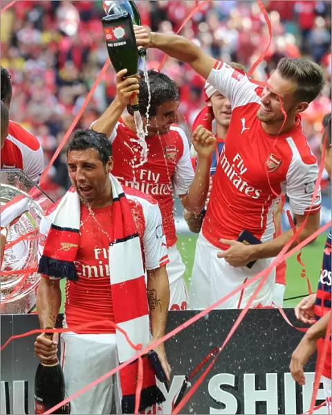 Aaron Ramsey and Santi Cazorla (Arsenal) celebrate winning the community shield. Arsenal 3
