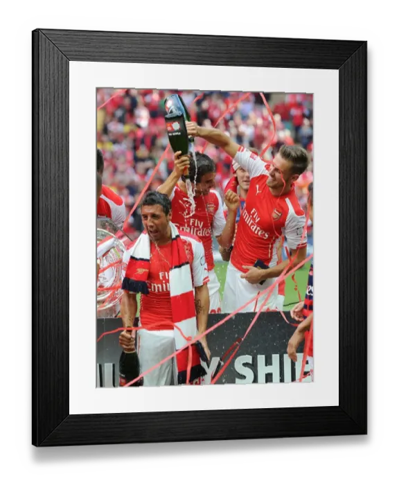 Framed Print : Aaron Ramsey and Santi Cazorla (Arsenal) celebrate winning the community shield. Arsenal 3