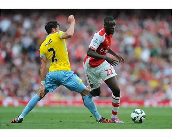 Arsenal's Yaya Sanogo Outmaneuvers Crystal Palace's Joel Ward
