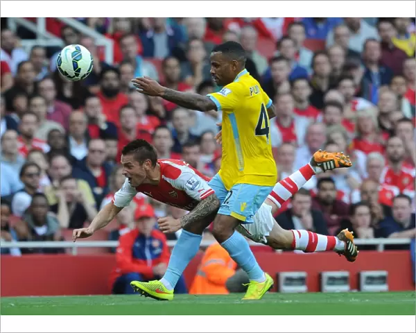 Arsenal vs Crystal Palace: Debuchy vs Puncheon in Intense Premier League Clash