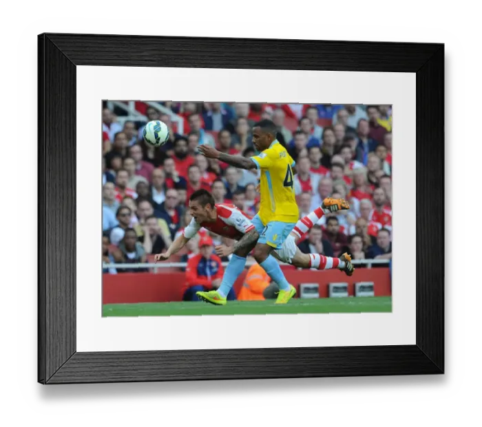 Framed Print : Arsenal vs Crystal Palace: Debuchy vs Puncheon in Intense Premier League Clash Framed Print : Arsenal vs Crystal Palace: Debuchy vs Puncheon in Intense Premier League Clash