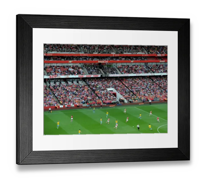 Framed Print : Arsenal's Victory: 2-1 Against Crystal Palace in the Barclays Premier League at Emirates Stadium (August 16, 2014)