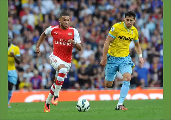 Arsenal's Alex Oxlade-Chamberlain Faces Off Against Crystal Palace's Joel Ward