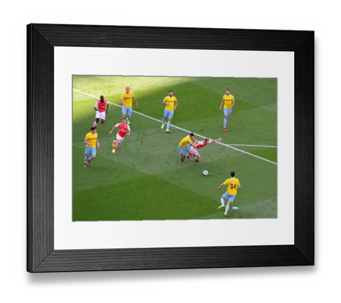 Framed Print : Aaron Ramsey (Arsenal) Scott Dann (Palace). Arsenal 2: 1 Crystal Palace. Barclays Premier League Framed Print : Aaron Ramsey (Arsenal) Scott Dann (Palace). Arsenal 2: 1 Crystal Palace. Barclays Premier League