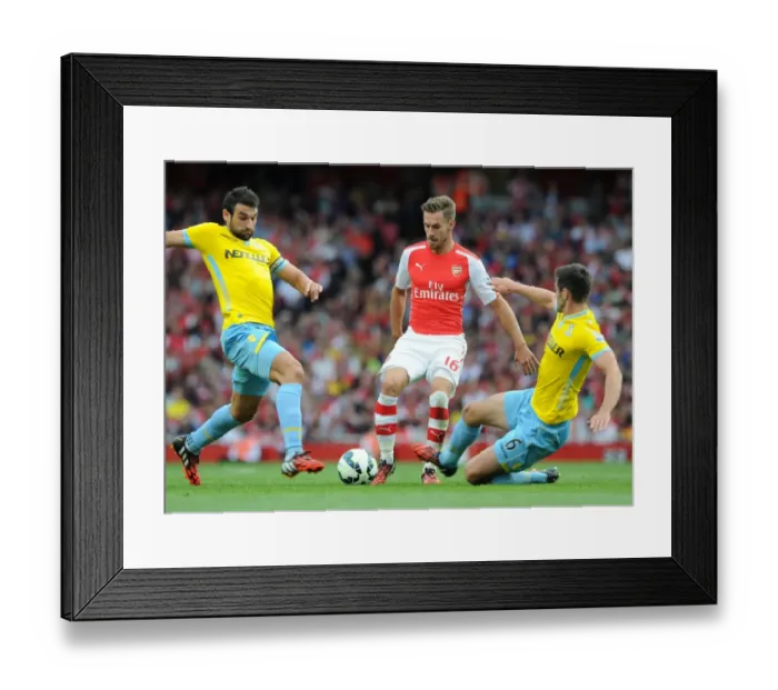 Framed Print : Aaron Ramsey (Arsenal) Mile Jedinak and Scott Dann (Palace). Arsenal 2: 1 Crystal Palace Framed Print : Aaron Ramsey (Arsenal) Mile Jedinak and Scott Dann (Palace). Arsenal 2: 1 Crystal Palace