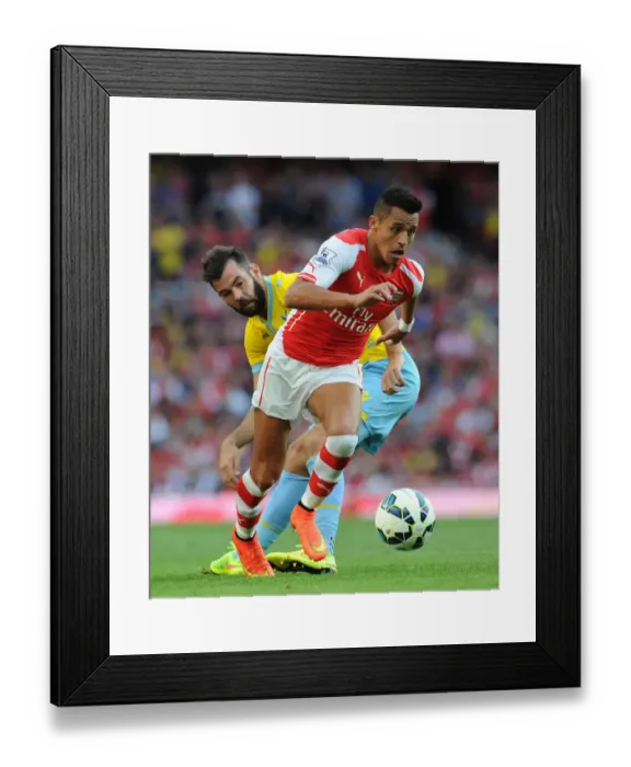Framed Print : Arsenal's Alexis Sanchez vs. Crystal Palace's Joe Ledley: A Premier League Battle Framed Print : Arsenal's Alexis Sanchez vs. Crystal Palace's Joe Ledley: A Premier League Battle