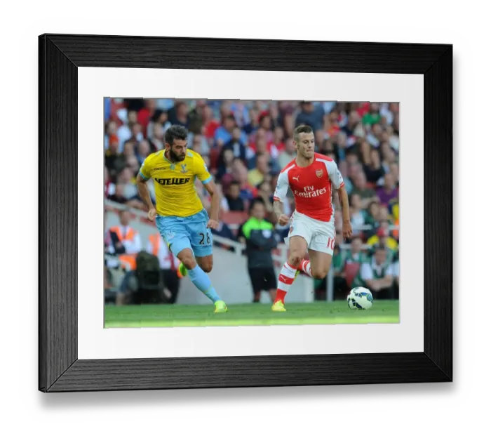 Framed Print : Jack Wilshere's Magic: Outsmarting Joe Ledley in Arsenal's Premier League Win (August 2014)