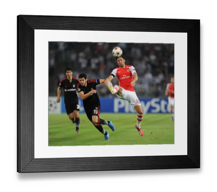 Framed Print : Olivier Giroud vs Pedro Franco: Intense Battle in Arsenal's UEFA Champions League Clash with Besiktas Framed Print : Olivier Giroud vs Pedro Franco: Intense Battle in Arsenal's UEFA Champions League Clash with Besiktas