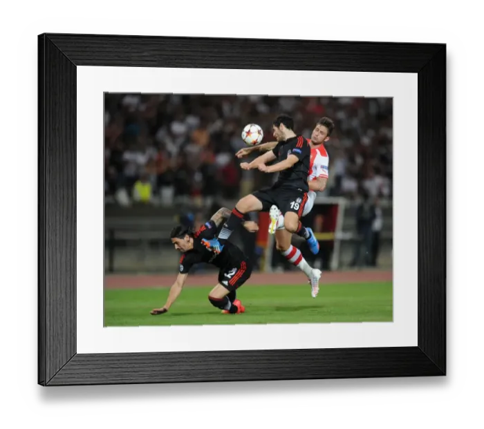 Framed Print : Arsenal's Olivier Giroud Faces Off Against Besiktas Defenders Ersan Gulum and Pedro Franco in UEFA Champions League Qualifier Framed Print : Arsenal's Olivier Giroud Faces Off Against Besiktas Defenders Ersan Gulum and Pedro Franco in UEFA Champions League Qualifier
