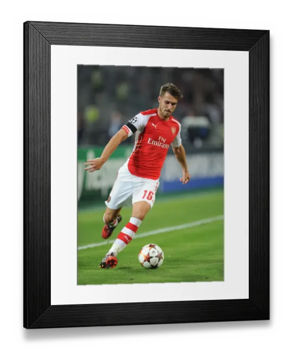 Framed Print : Aaron Ramsey in Action: Arsenal vs. Besiktas, UEFA Champions League Qualifiers 2014 Framed Print : Aaron Ramsey in Action: Arsenal vs. Besiktas, UEFA Champions League Qualifiers 2014